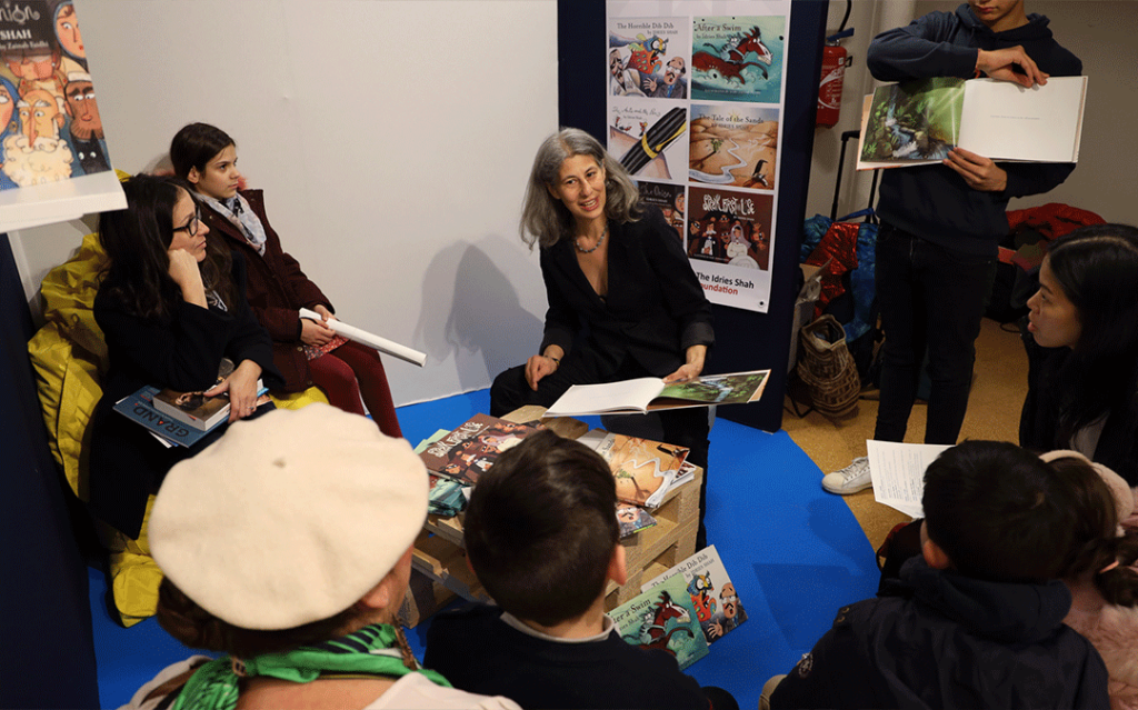 Saira Shah reading children's books in Paris
