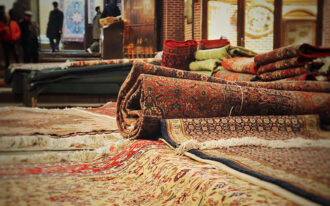 A pile of rugs sitting on top of a floor